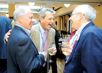 Members of the Class of 1962 share a laugh at their 50th reunion class dinner. Photo: Eileen Barroso